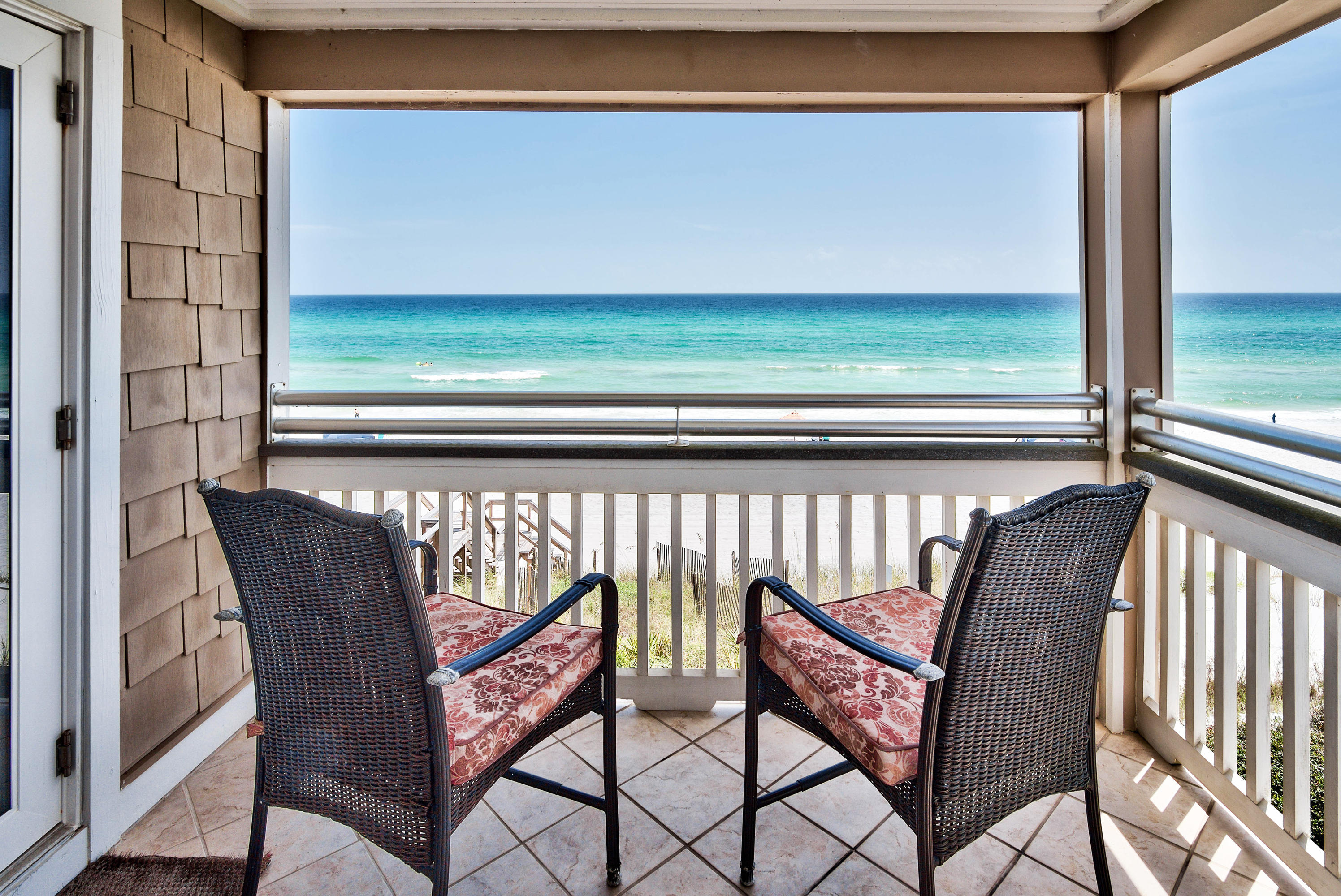 179 Pelican Circle Seacrest, FL 32461 - Photo 11 of 94 a view of two chairs in the balcony