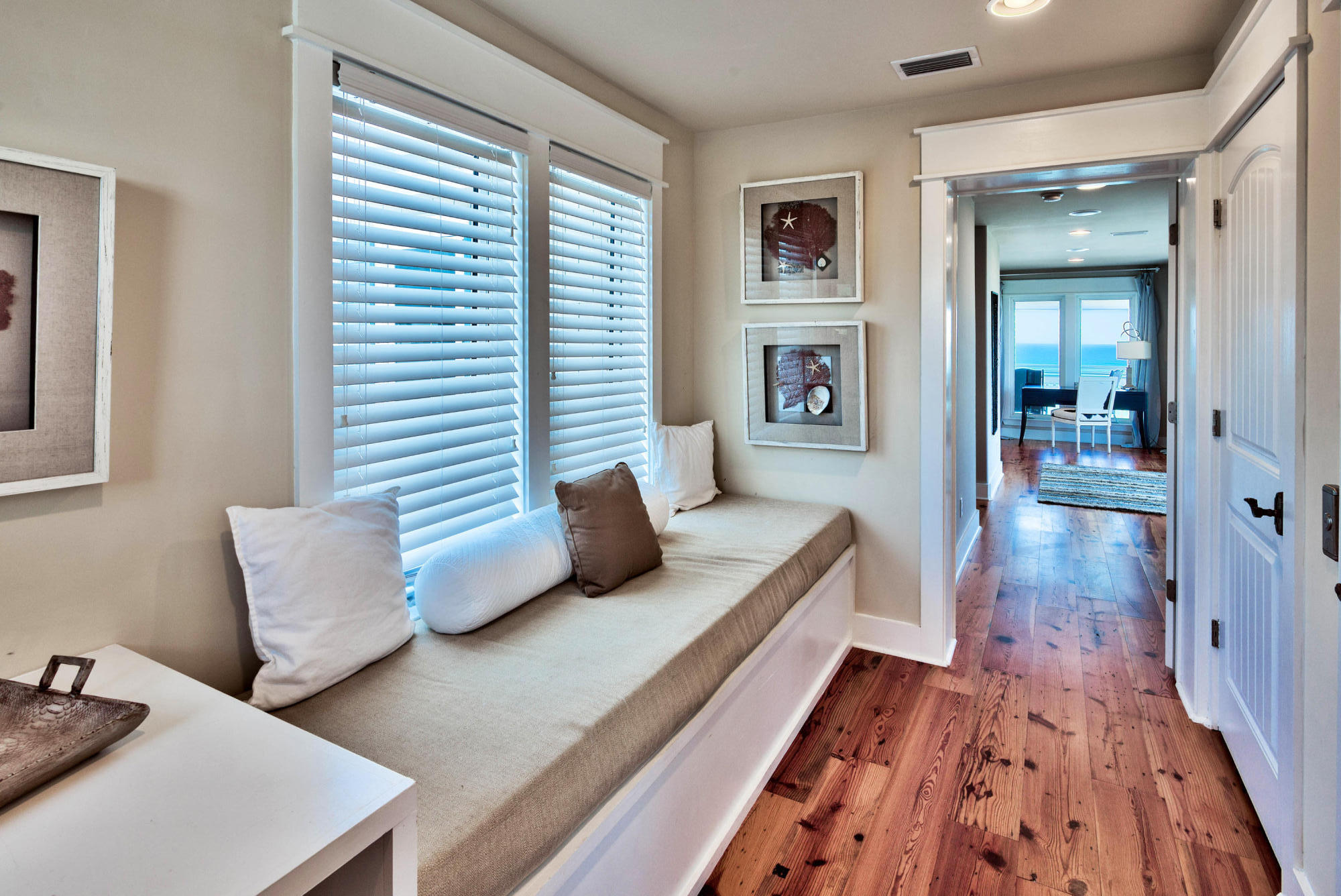179 Pelican Circle Seacrest, FL 32461 - Photo 16 of 94 a living room with furniture and a wooden floor