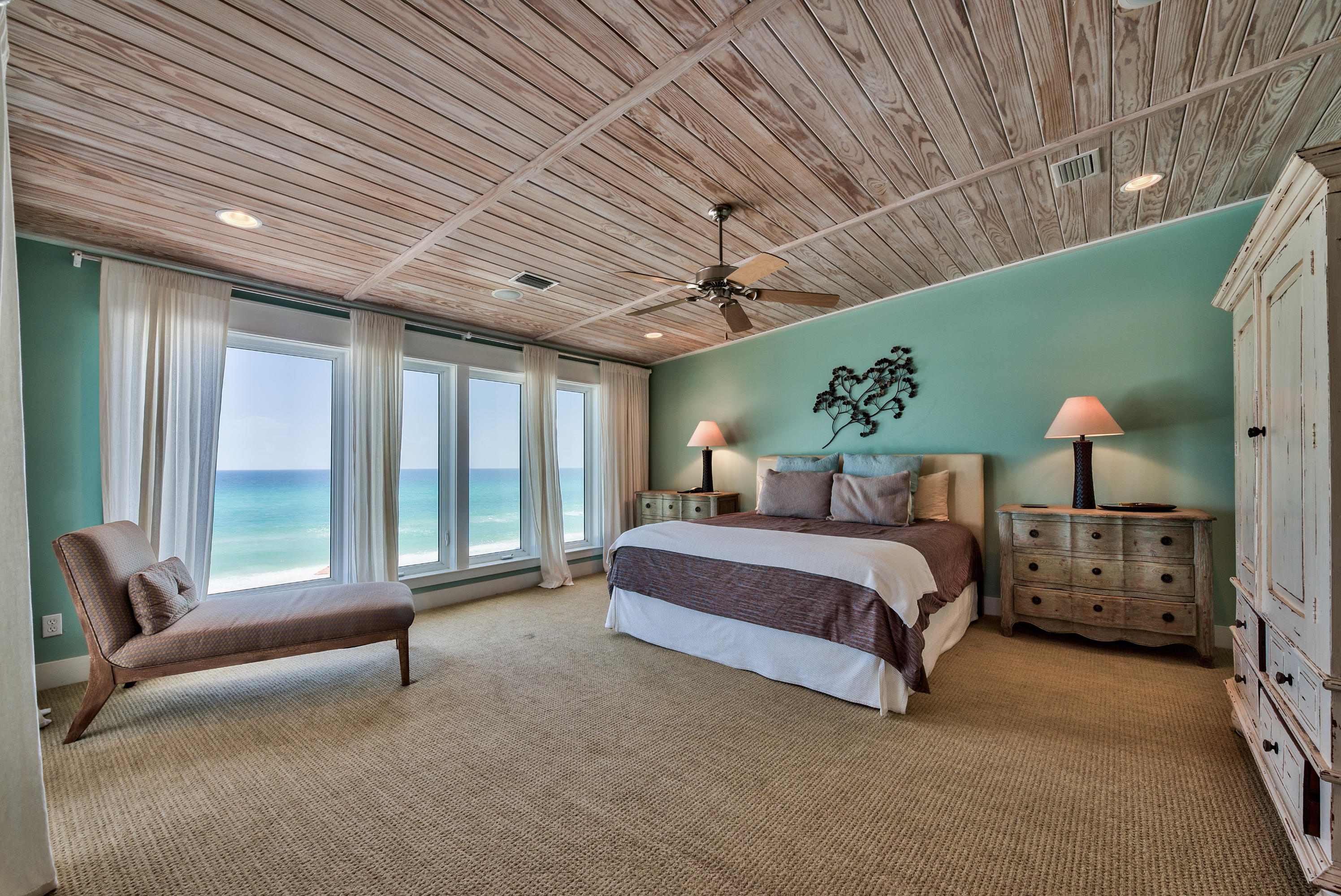 179 Pelican Circle Seacrest, FL 32461 - Photo 18 of 94 a spacious bedroom with two beds and large windows