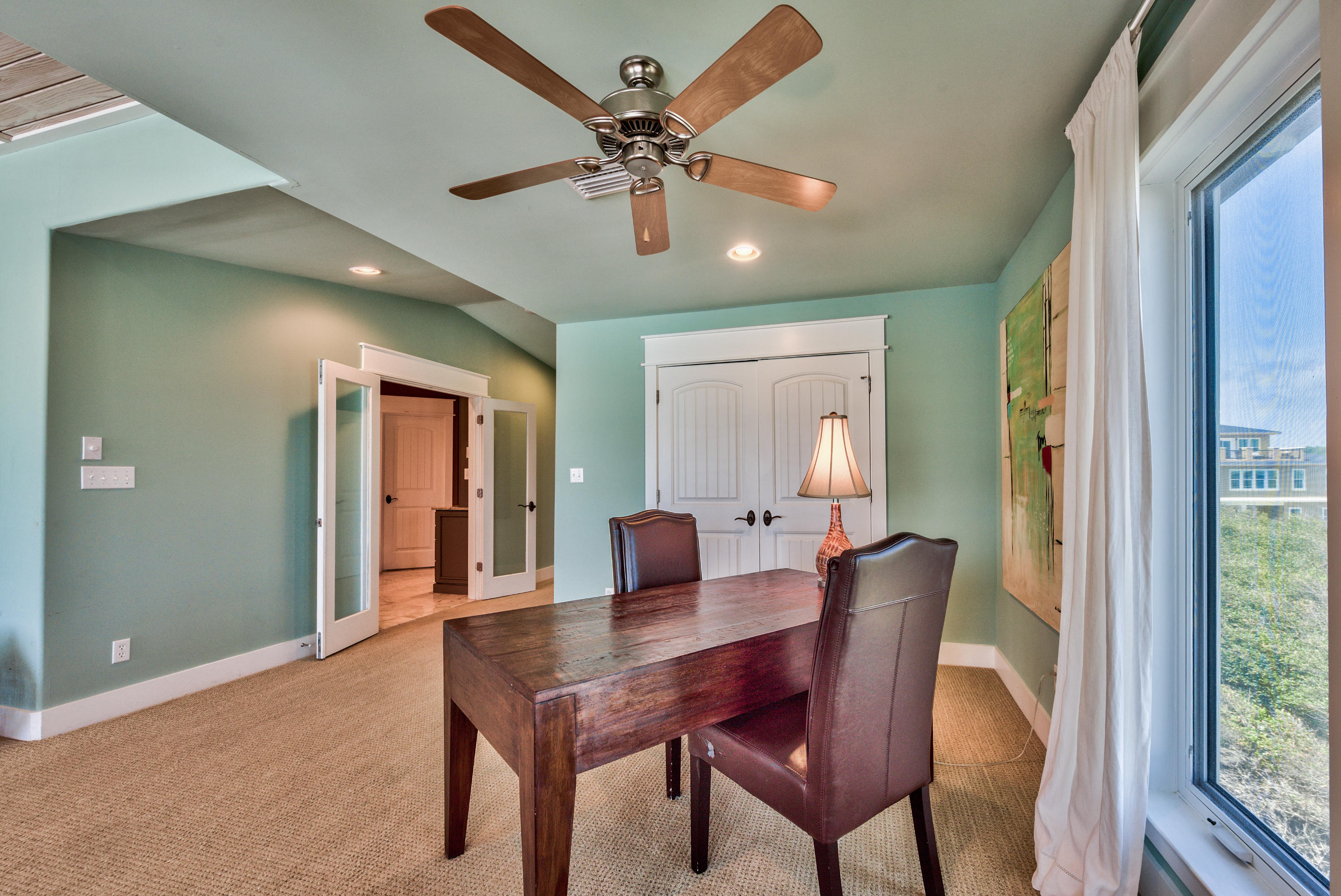 179 Pelican Circle Seacrest, FL 32461 - Photo 22 of 94 a dining room with furniture window and wooden floor