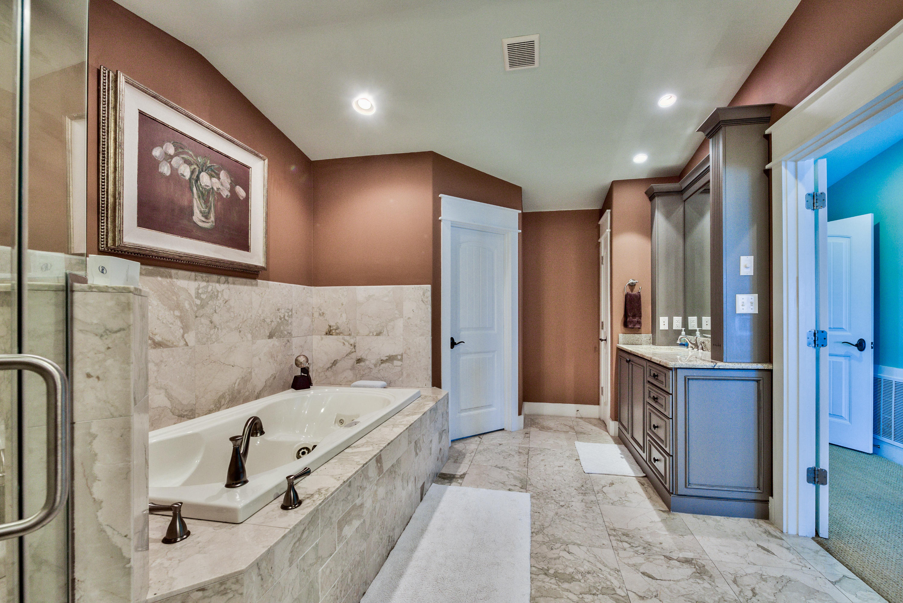 179 Pelican Circle Seacrest, FL 32461 - Photo 25 of 94 a bathroom with a bathtub and a double vanity sink