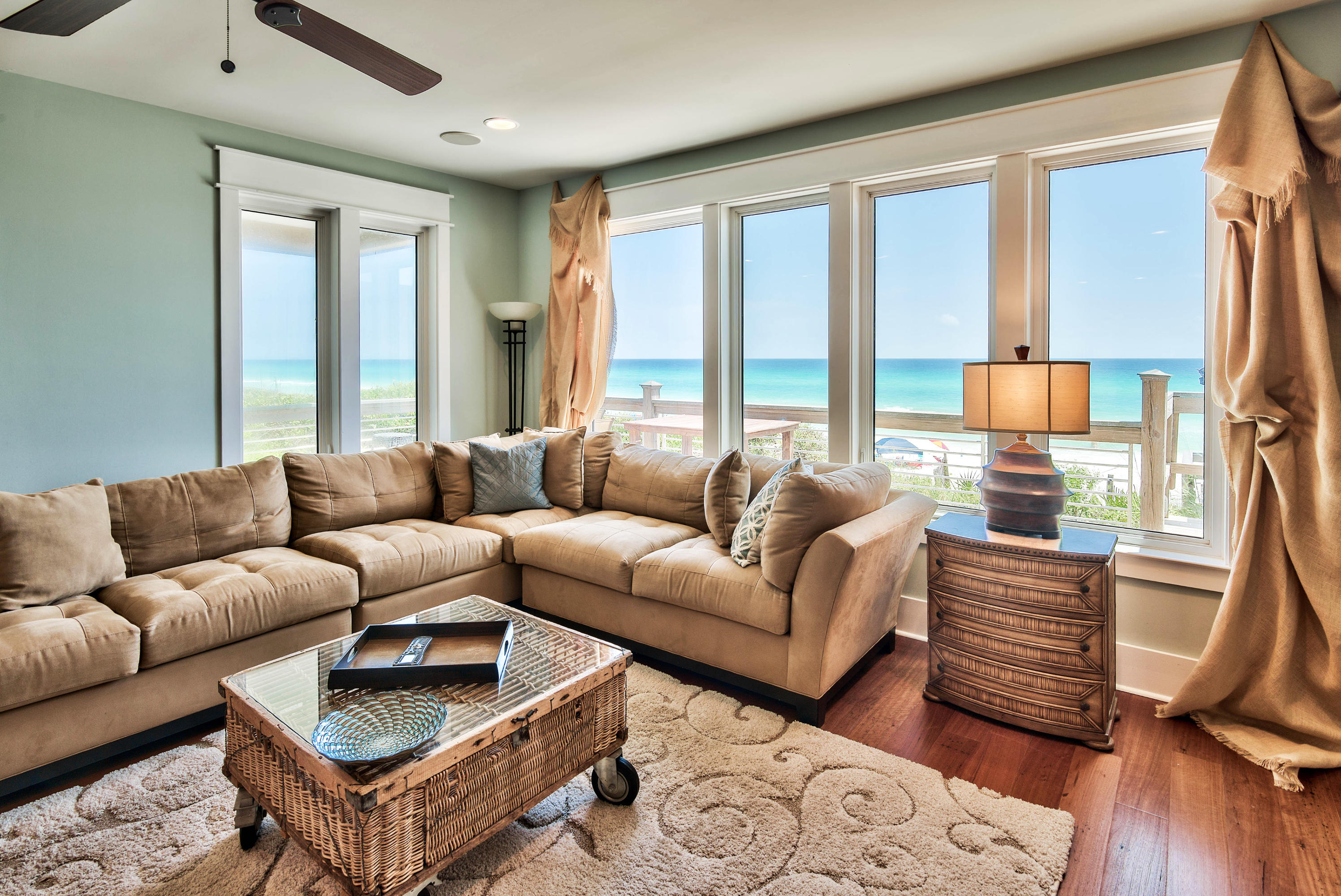 179 Pelican Circle Seacrest, FL 32461 - Photo 30 of 94 a living room with furniture a large window and wooden floor