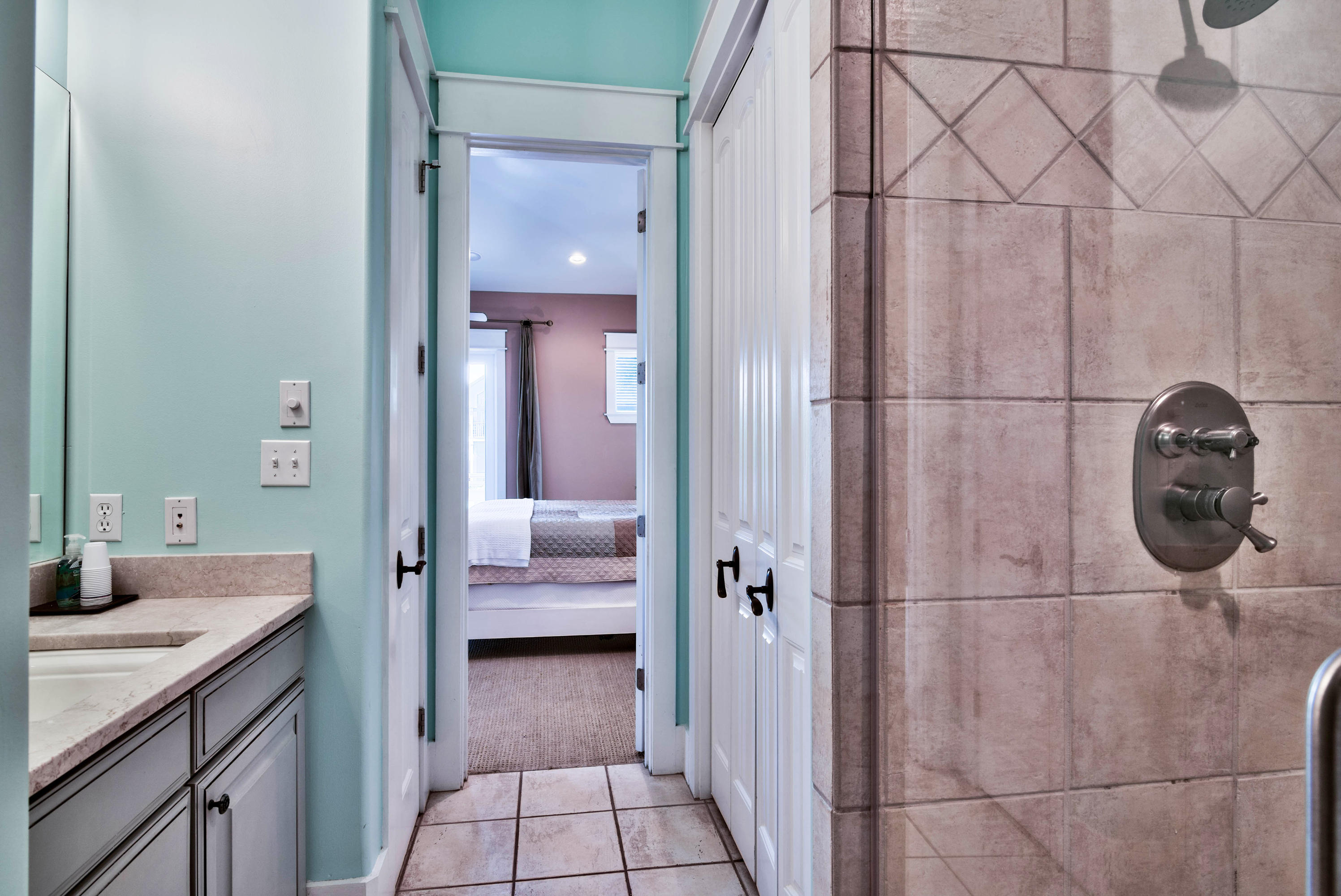 179 Pelican Circle Seacrest, FL 32461 - Photo 43 of 94 a en suite bathroom with a sink and mirror