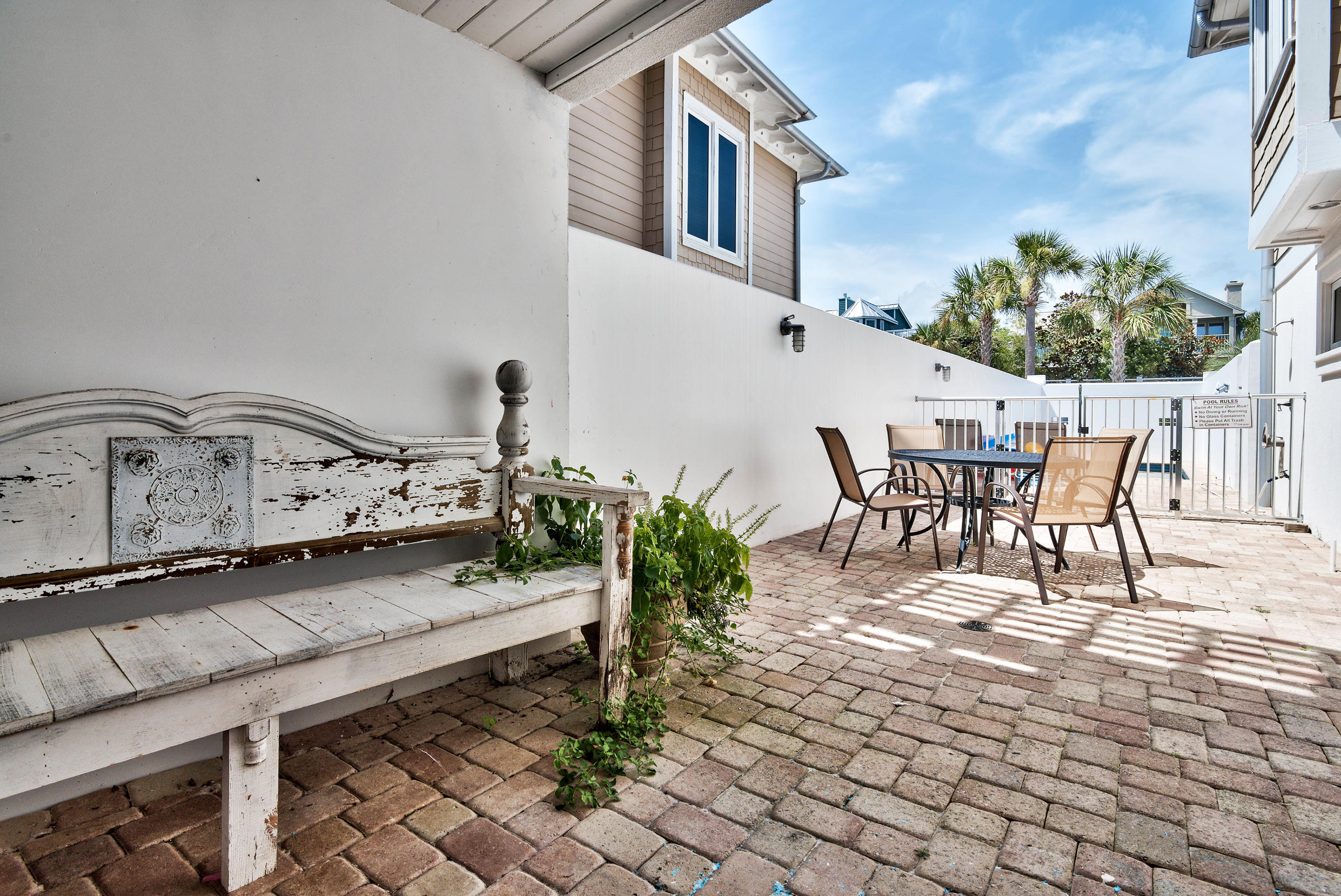 179 Pelican Circle Seacrest, FL 32461 - Photo 44 of 94 a view of a patio with table and chairs