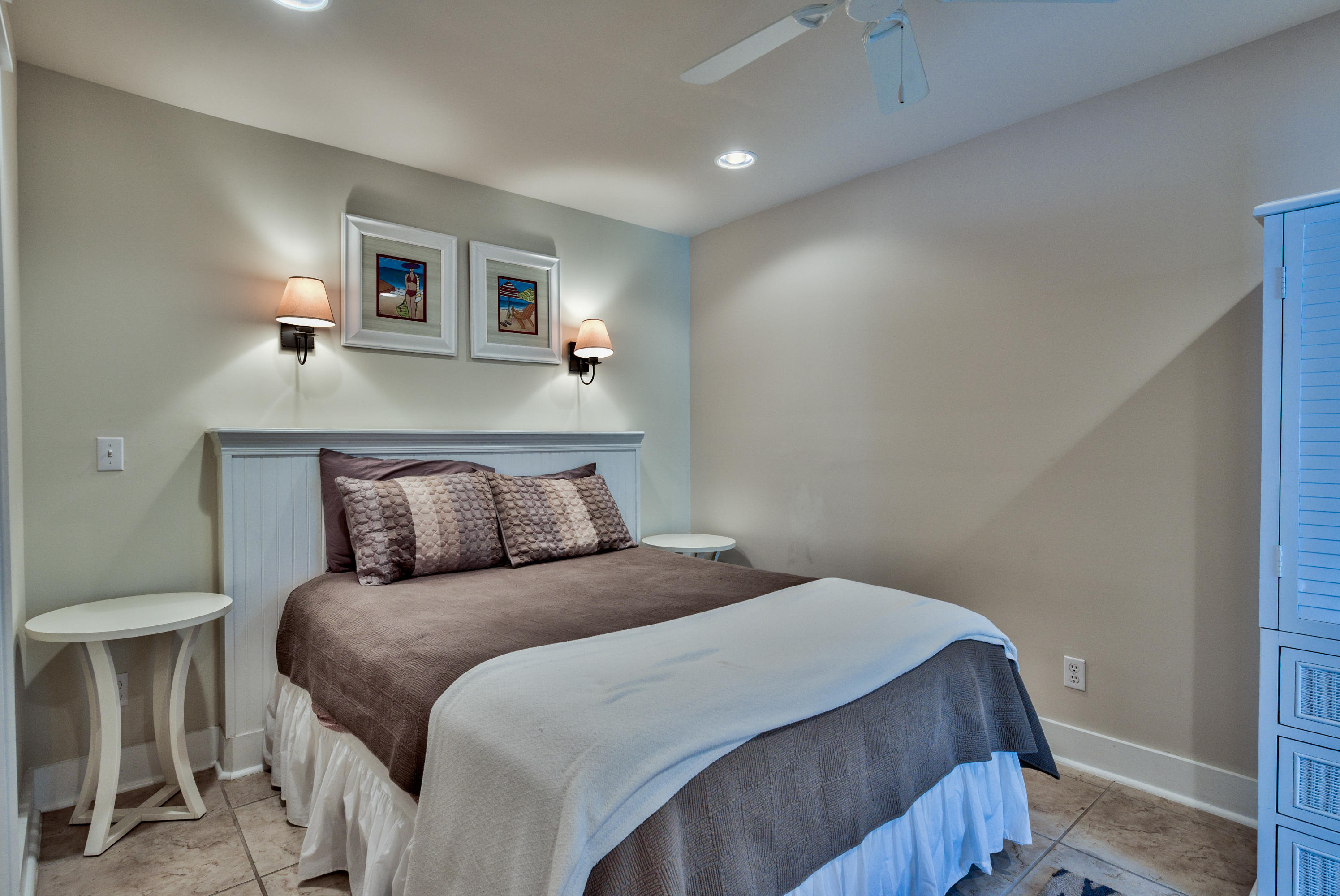 179 Pelican Circle Seacrest, FL 32461 - Photo 49 of 94 a bedroom with a bed and night stand