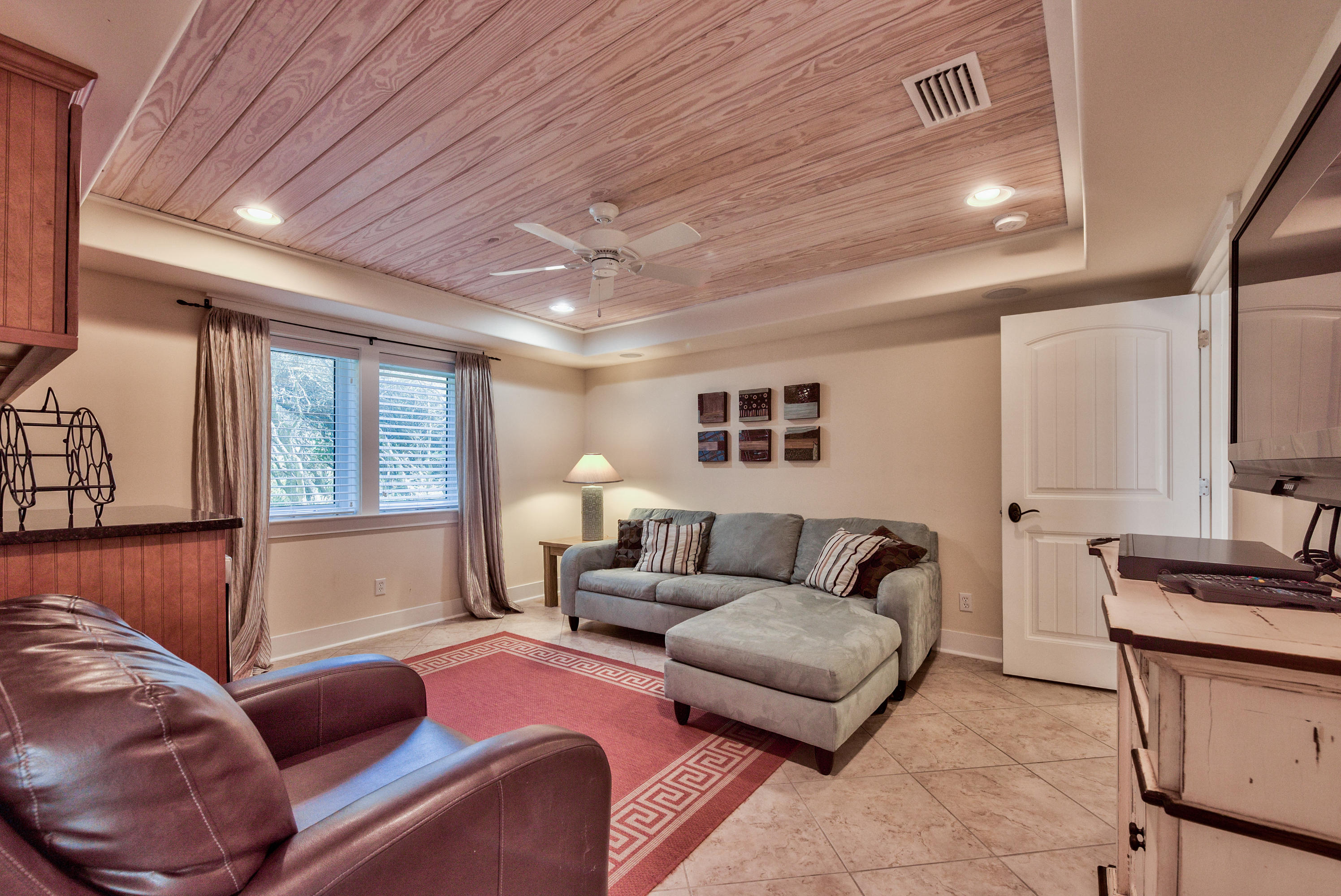 179 Pelican Circle Seacrest, FL 32461 - Photo 56 of 94 a living room with furniture and a window