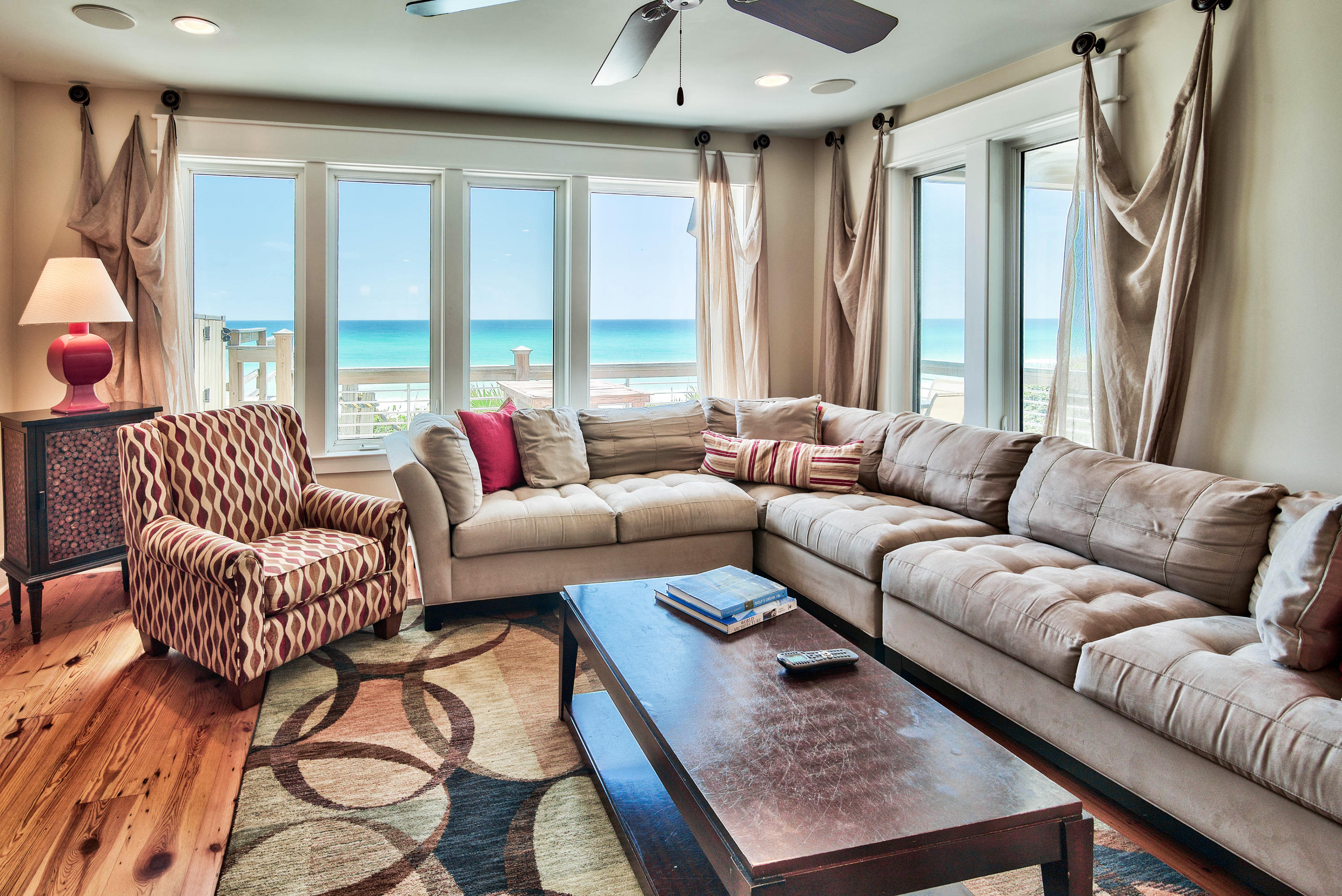 179 Pelican Circle Seacrest, FL 32461 - Photo 60 of 94 a living room with furniture and a large window