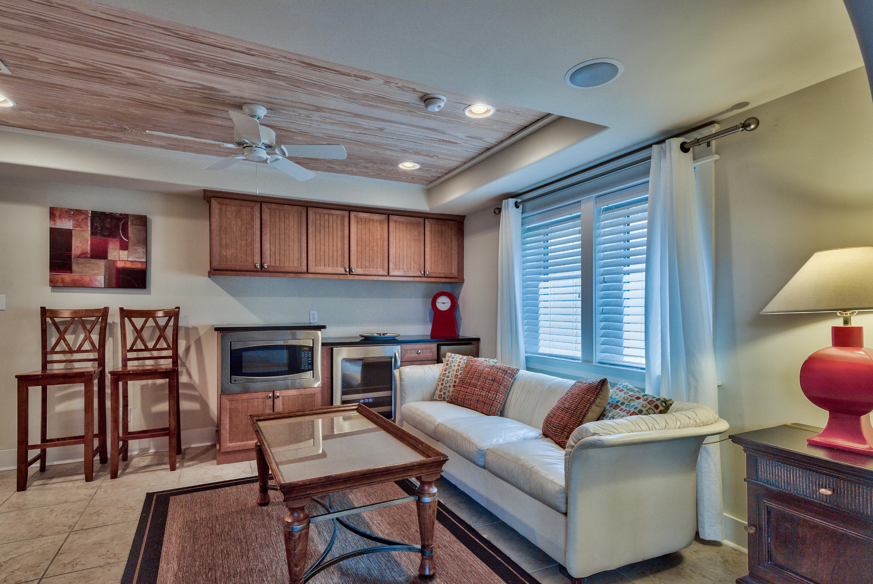 179 Pelican Circle Seacrest, FL 32461 - Photo 73 of 94 a living room with furniture and a flat screen tv