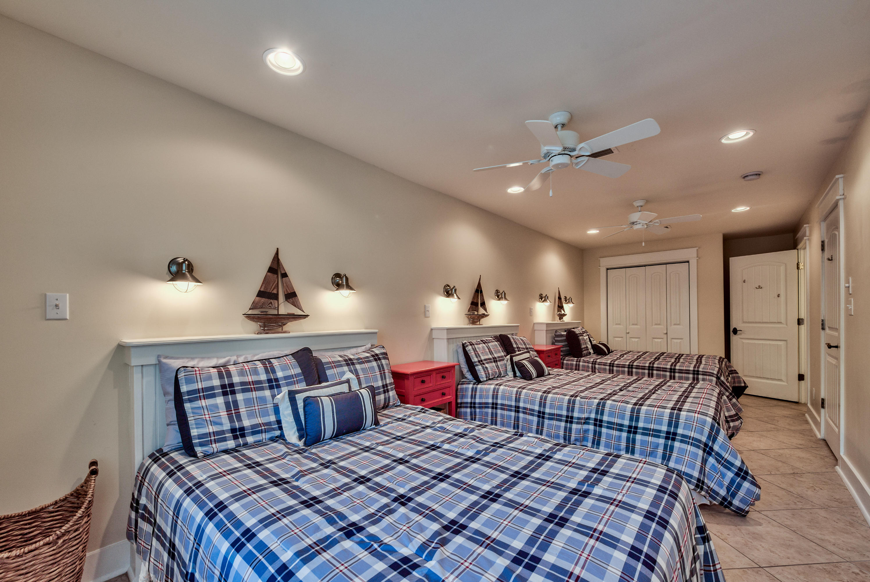 179 Pelican Circle Seacrest, FL 32461 - Photo 80 of 94 a living room with furniture a ceiling fan and a rug