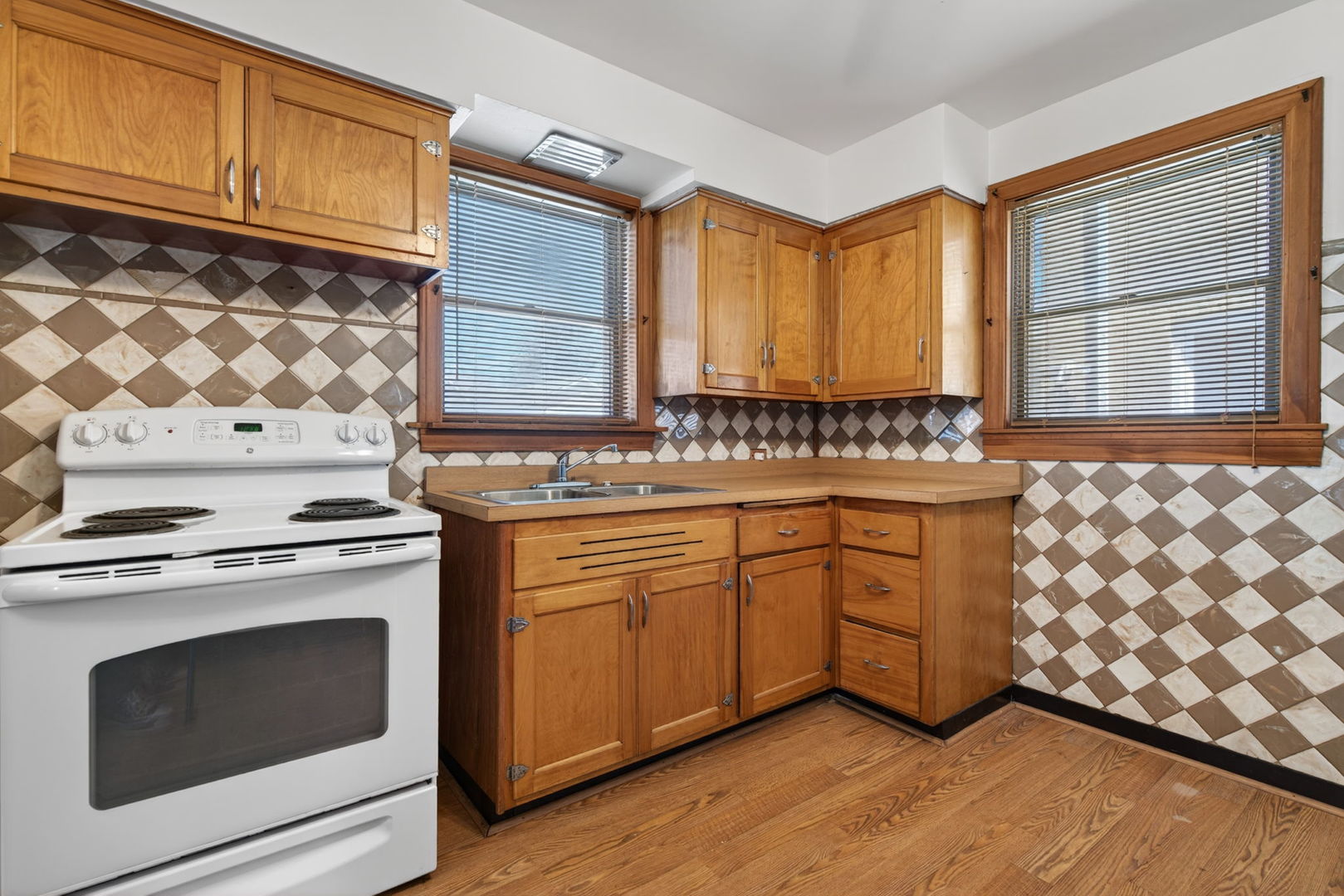 9020 West Forestview Drive North Riverside, IL 60546 - Photo 8 of 19 a kitchen with granite countertop cabinets stainless steel appliances and a sink