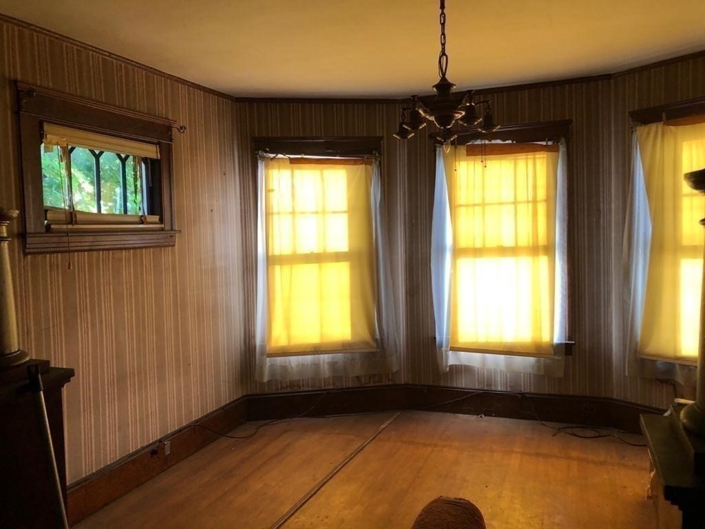 113 Perry Avenue Worcester, MA 01610 - Photo 12 of 16 a view of an empty room with a window