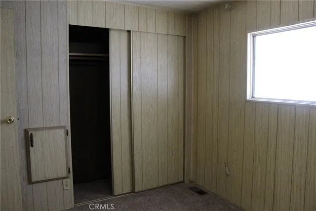 a bathroom with a sink a toilet and shower curtain