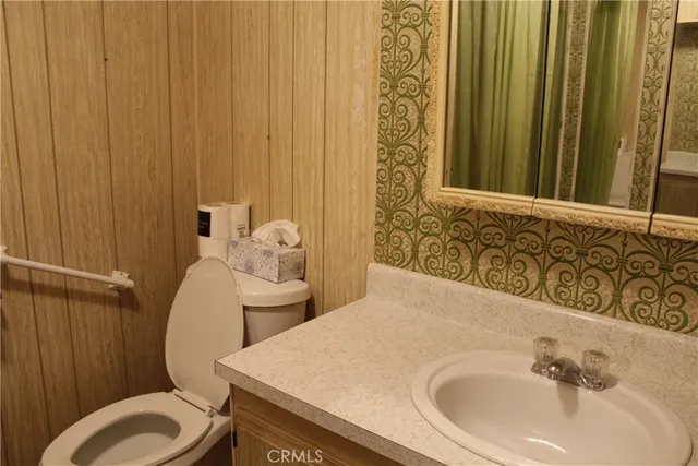 a bathroom with a shower and a door