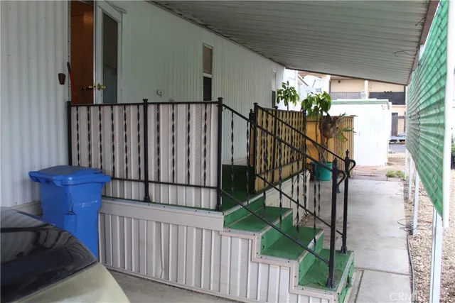 a view of stairs and a porch