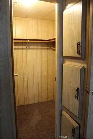 a bathroom with a toilet a sink and a window