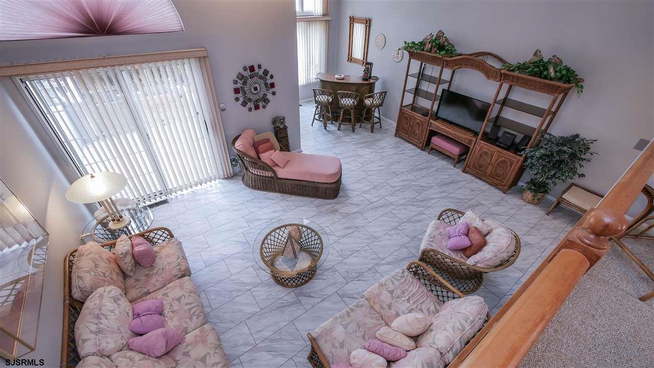 11 Sailfish Drive Brigantine, NJ 08203 - Photo 11 of 23 a living room with furniture and wooden floor