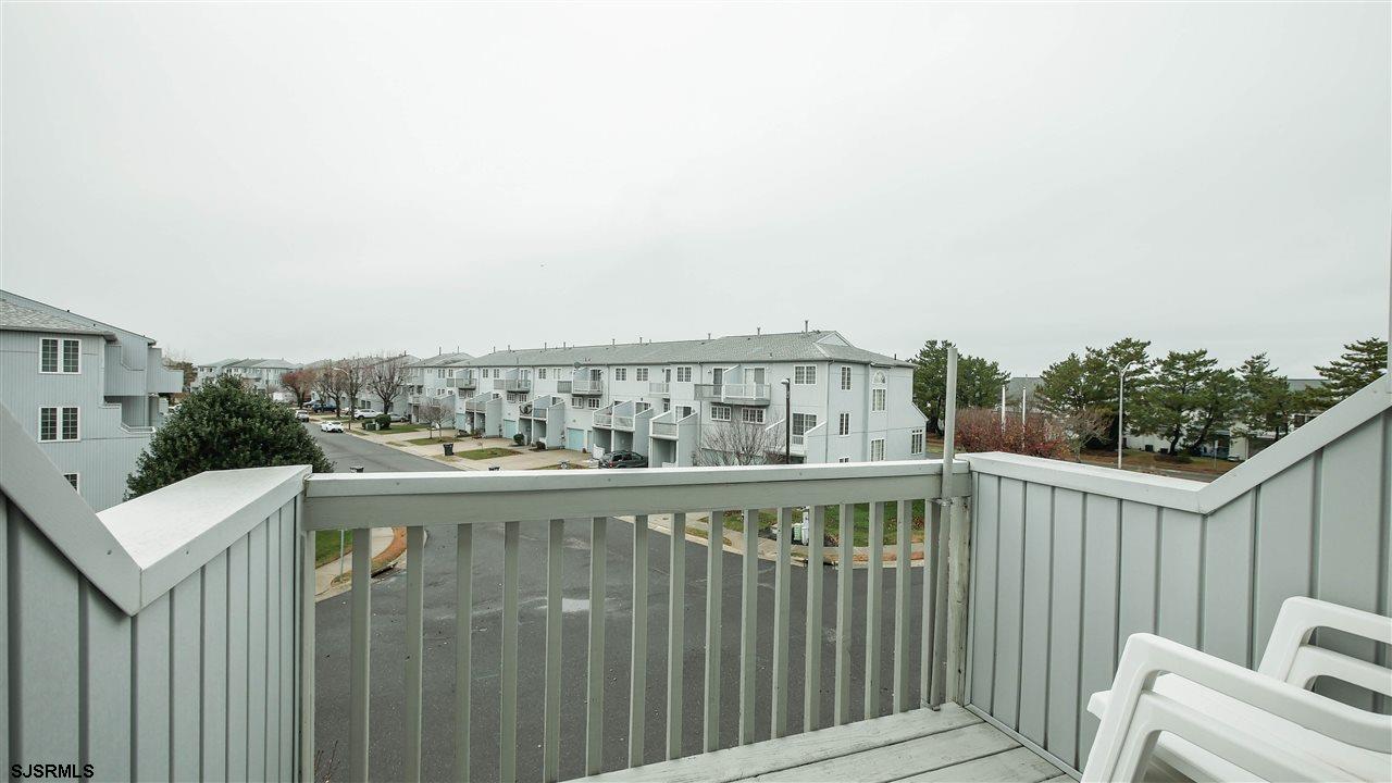 11 Sailfish Drive Brigantine, NJ 08203 - Photo 2 of 23 a view of a balcony with furniture