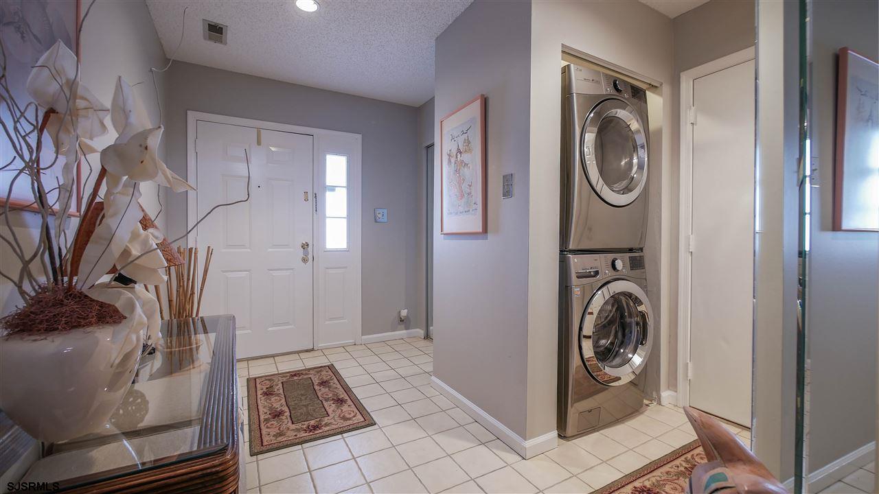 11 Sailfish Drive Brigantine, NJ 08203 - Photo 3 of 23 a view of a storage & utility room with a washer dryer