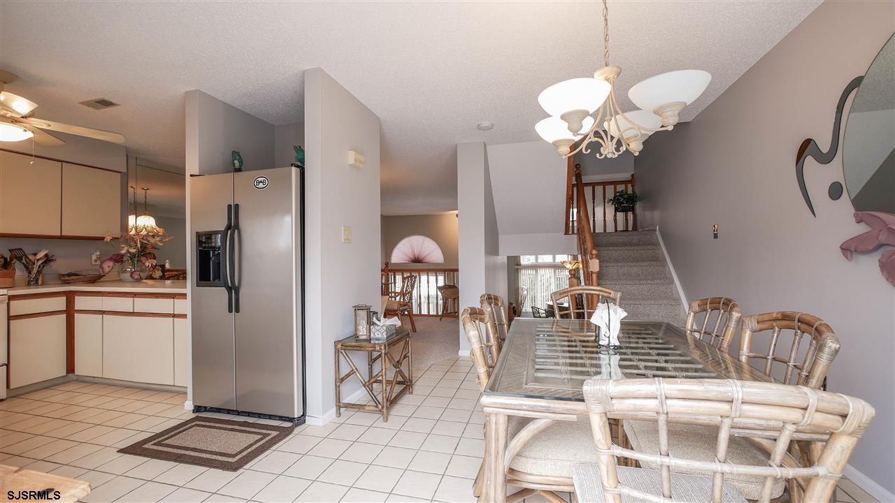11 Sailfish Drive Brigantine, NJ 08203 - Photo 7 of 23 a very nice looking dining room with a table and chairs