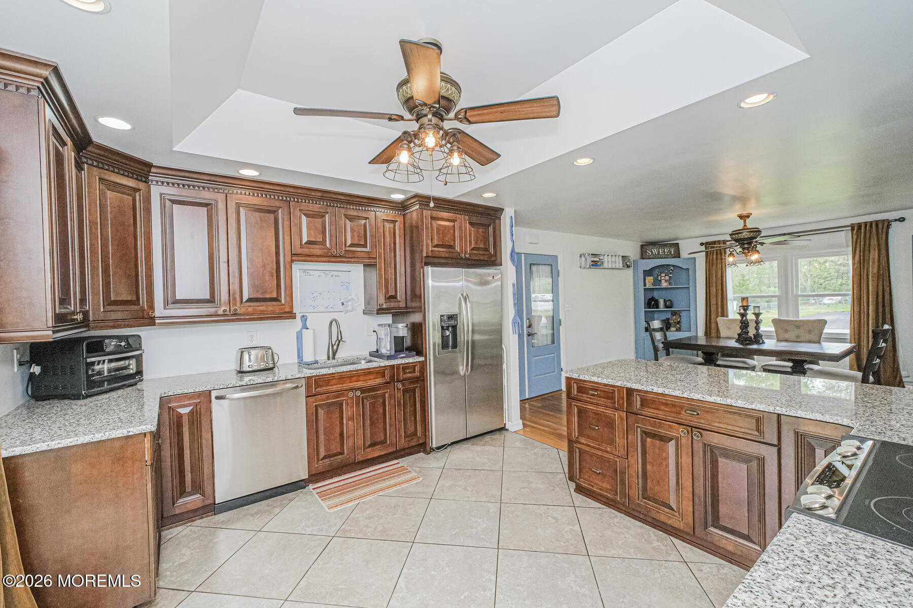 5 Riccis Drive Jackson, NJ 08527 - Photo 16 of 32 a kitchen with stainless steel appliances granite countertop a sink and cabinets