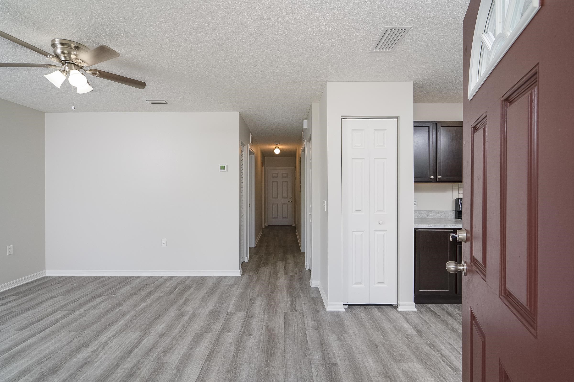 874 Ervin Street St. Augustine, FL 32084 - Photo 12 of 29 a view of a livingroom with wooden floor