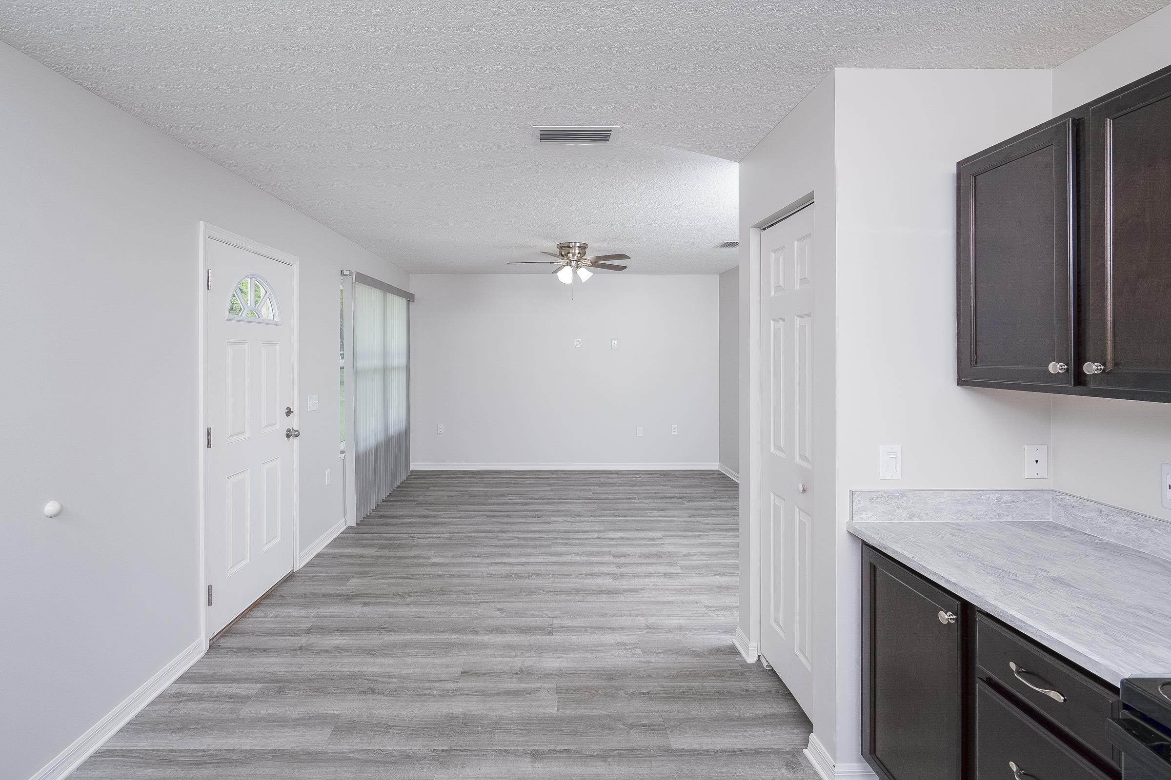 874 Ervin Street St. Augustine, FL 32084 - Photo 15 of 29 a view of a kitchen from the hallway