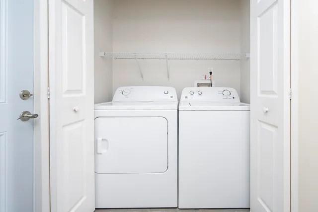 a utility room with dryer and washer