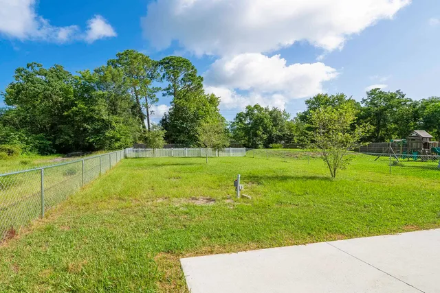 a view of a golf course with a lake