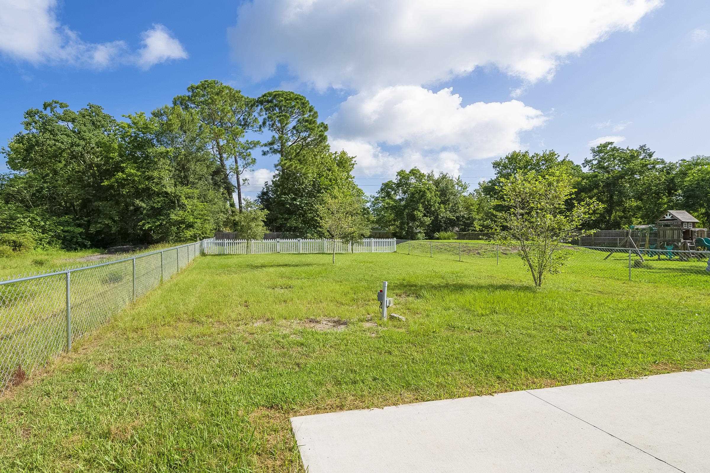 874 Ervin Street St. Augustine, FL 32084 - Photo 10 of 29 a view of a golf course with a lake