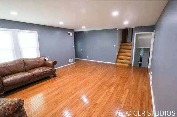 a view of livingroom with furniture and wooden floor