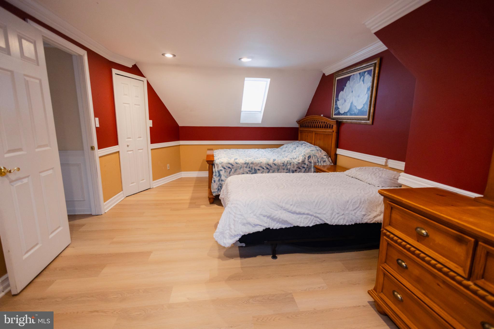 24 Rose Apple Road Levittown, PA 19056 - Photo 19 of 24 a bedroom with a bed and a dresser