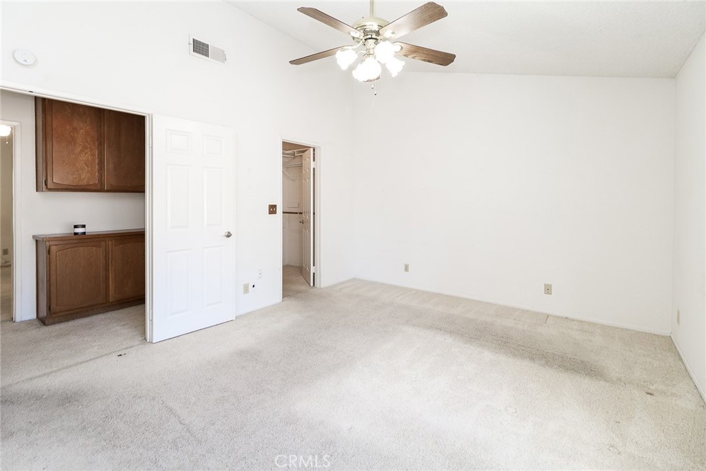 345 Jeremiah Drive, Unit C Simi Valley, CA 93065 - Photo 20 of 66 an empty room with a ceiling fan and a window