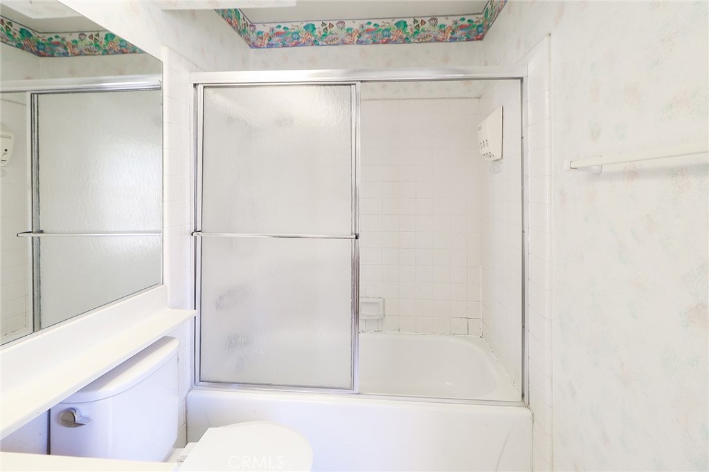 345 Jeremiah Drive, Unit C Simi Valley, CA 93065 - Photo 21 of 66 a bathroom with a bathtub and a shower