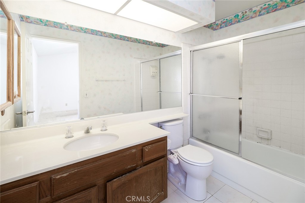 345 Jeremiah Drive, Unit C Simi Valley, CA 93065 - Photo 23 of 66 a bathroom with a sink a toilet a mirror and shower