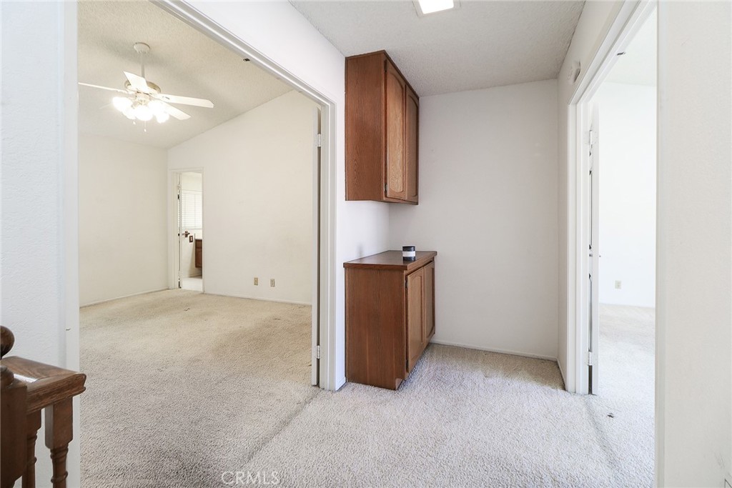 345 Jeremiah Drive, Unit C Simi Valley, CA 93065 - Photo 26 of 66 a view of a room with closet and wooden floor