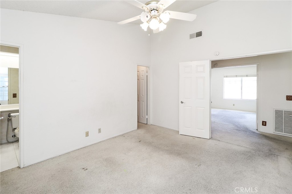 345 Jeremiah Drive, Unit C Simi Valley, CA 93065 - Photo 28 of 66 an empty room with fan and windows