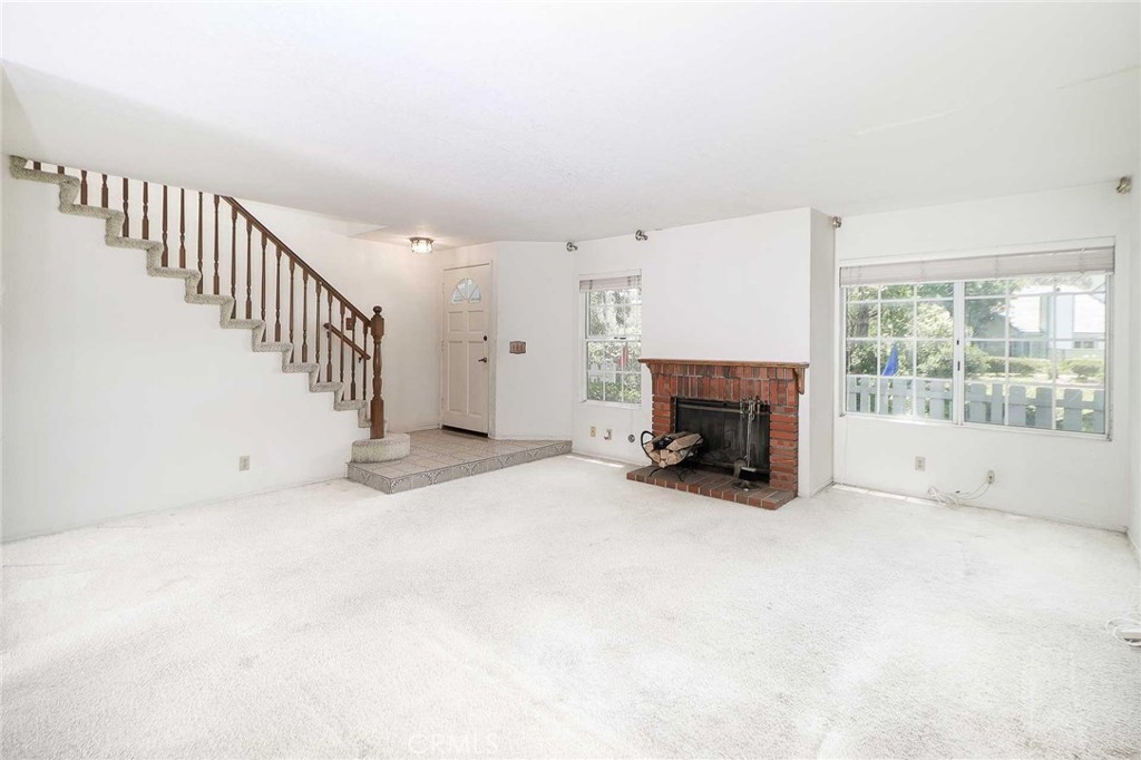 345 Jeremiah Drive, Unit C Simi Valley, CA 93065 - Photo 3 of 66 Living room, note the fireplace!
