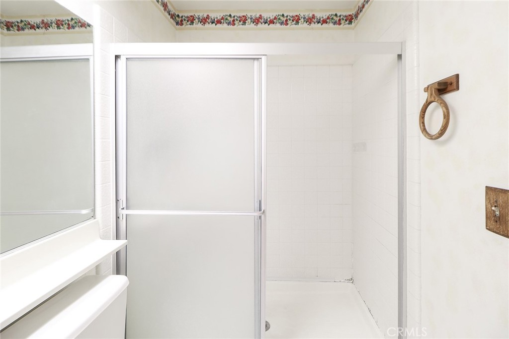 345 Jeremiah Drive, Unit C Simi Valley, CA 93065 - Photo 31 of 66 a bathroom with a glass shower door
