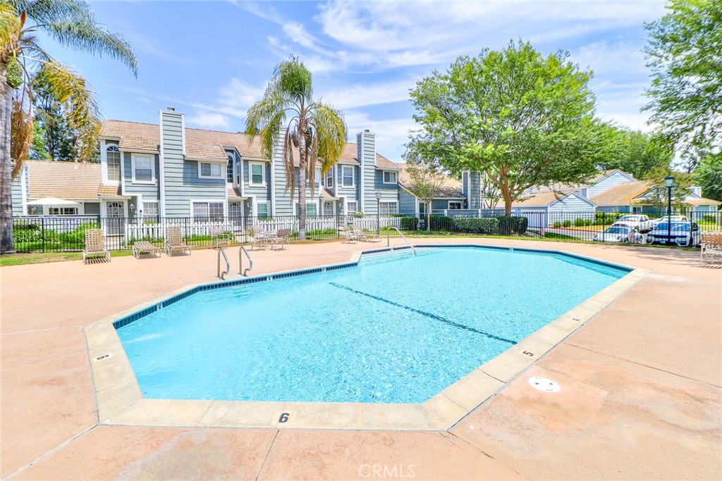 345 Jeremiah Drive, Unit C Simi Valley, CA 93065 - Photo 46 of 66 a view of a swimming pool with outdoor seating