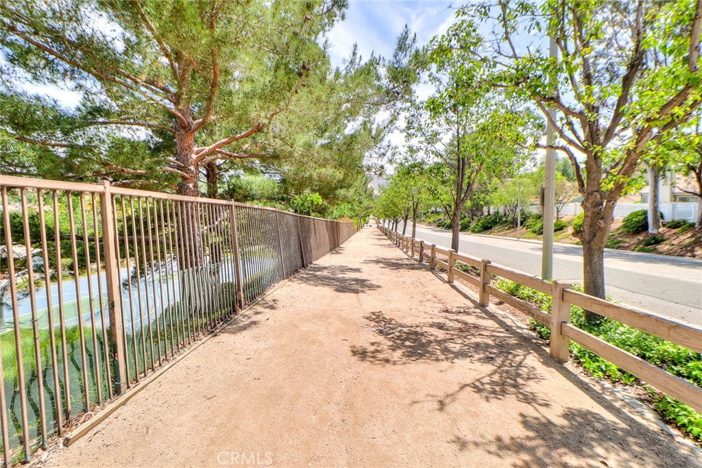 345 Jeremiah Drive, Unit C Simi Valley, CA 93065 - Photo 53 of 66 a view of a pathway with a yard