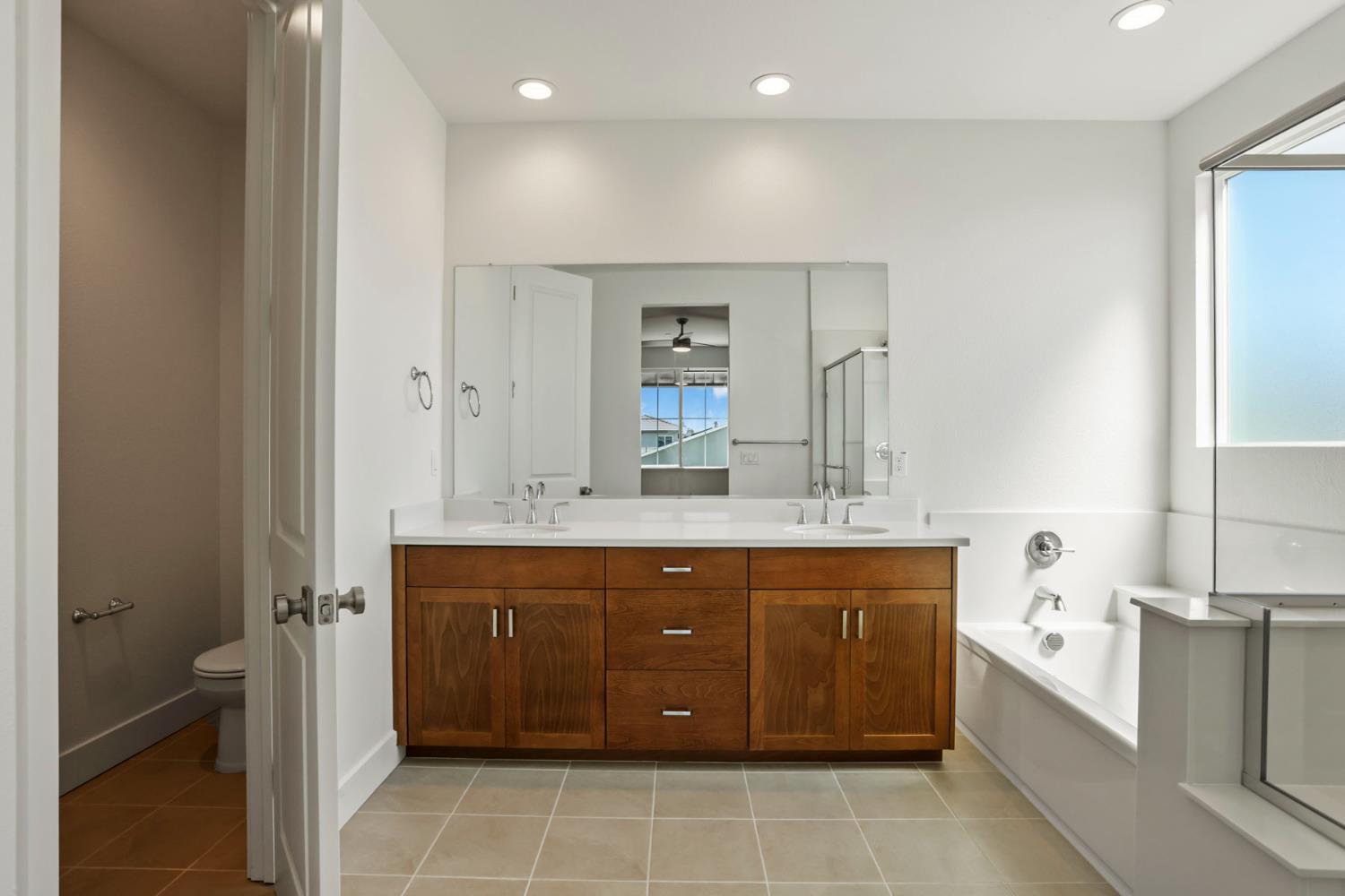 3265 Rugnao Way Manteca, CA 95337 - Photo 25 of 38 Dual vanity sinks with undermount sinks