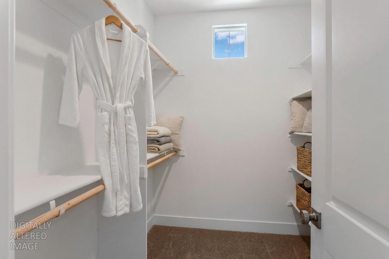 3265 Rugnao Way Manteca, CA 95337 - Photo 27 of 38 Primary walk-in closet