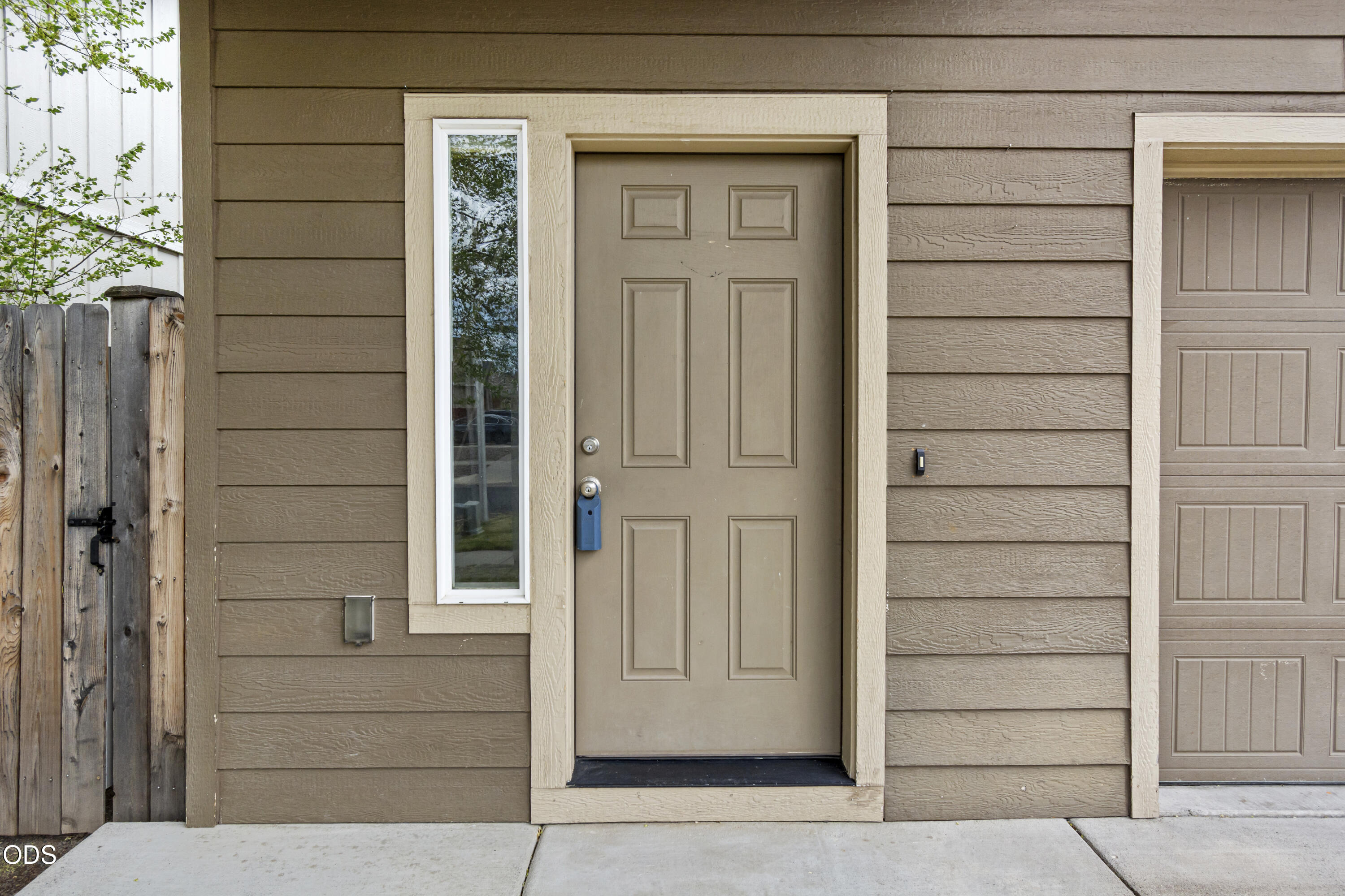 21332 Oconnor Way Bend, OR 97701 - Photo 12 of 33 front view of a house with a door and a window