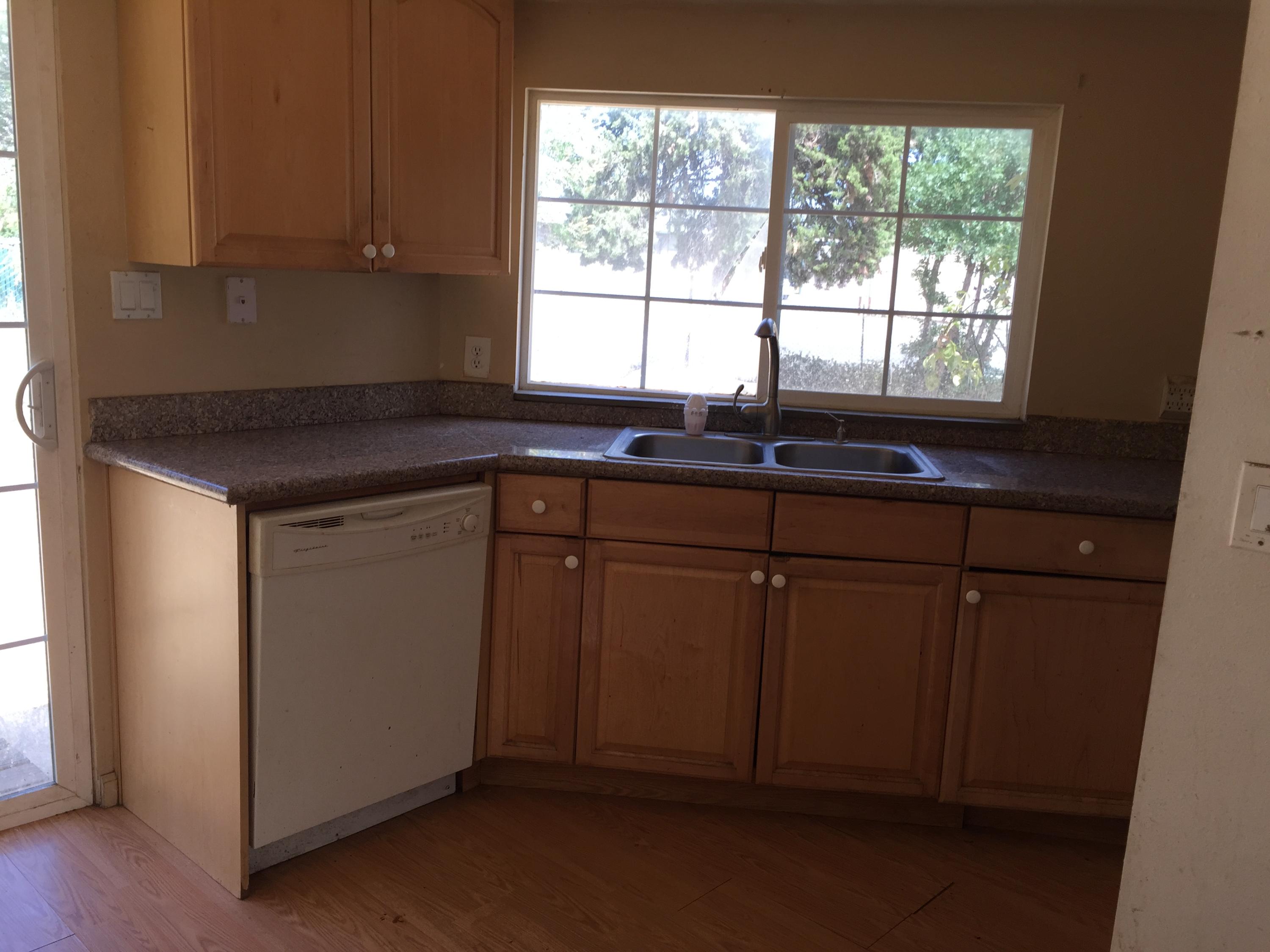 5510 Cedars Road Redding, CA 96001 - Photo 7 of 19 a kitchen with sink cabinets and window