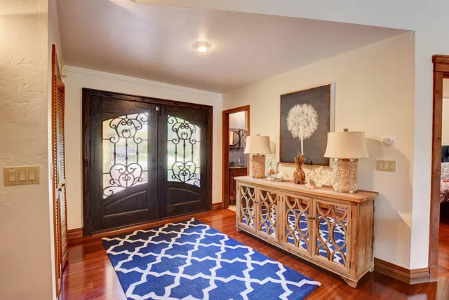 a view of an entryway with a front door