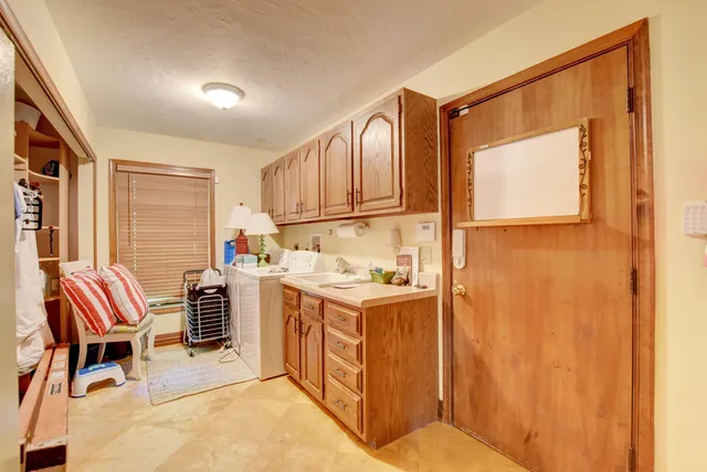 a storage room with a washer and dryer