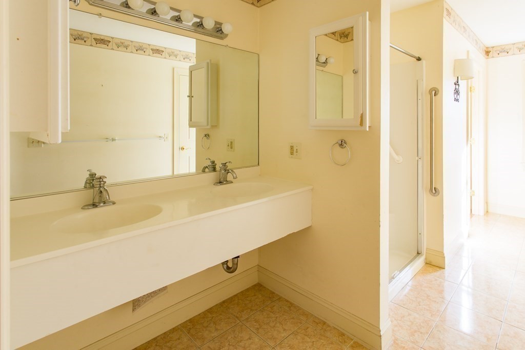 76 Davis Road New Braintree, MA 01531 - Photo 13 of 40 a bathroom with a sink and a shower