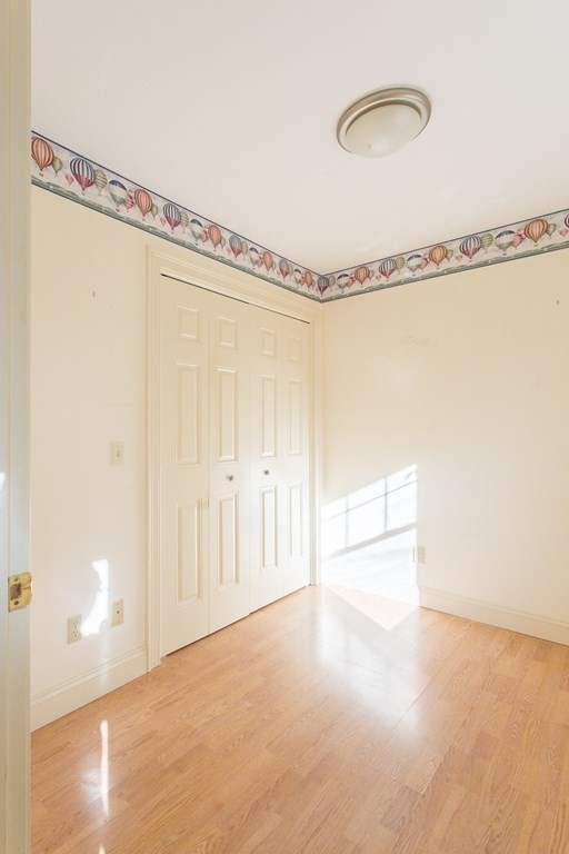 76 Davis Road New Braintree, MA 01531 - Photo 25 of 40 a view of a room with racks on the wall