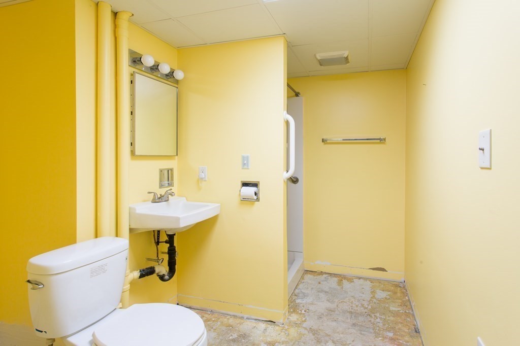 76 Davis Road New Braintree, MA 01531 - Photo 27 of 40 a bathroom with a sink toilet and shower