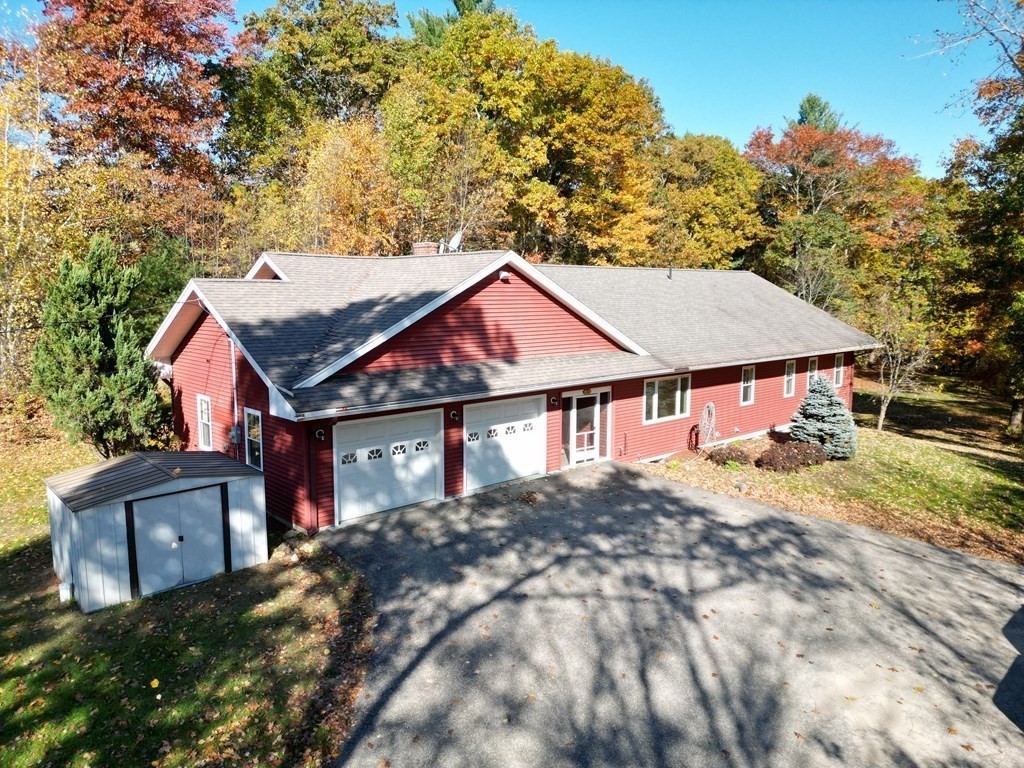 76 Davis Road New Braintree, MA 01531 - Photo 33 of 40 front view of a house with a yard